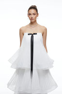 Elvire White Strapless Tiered Pleated Maxi Dress with Black Bow